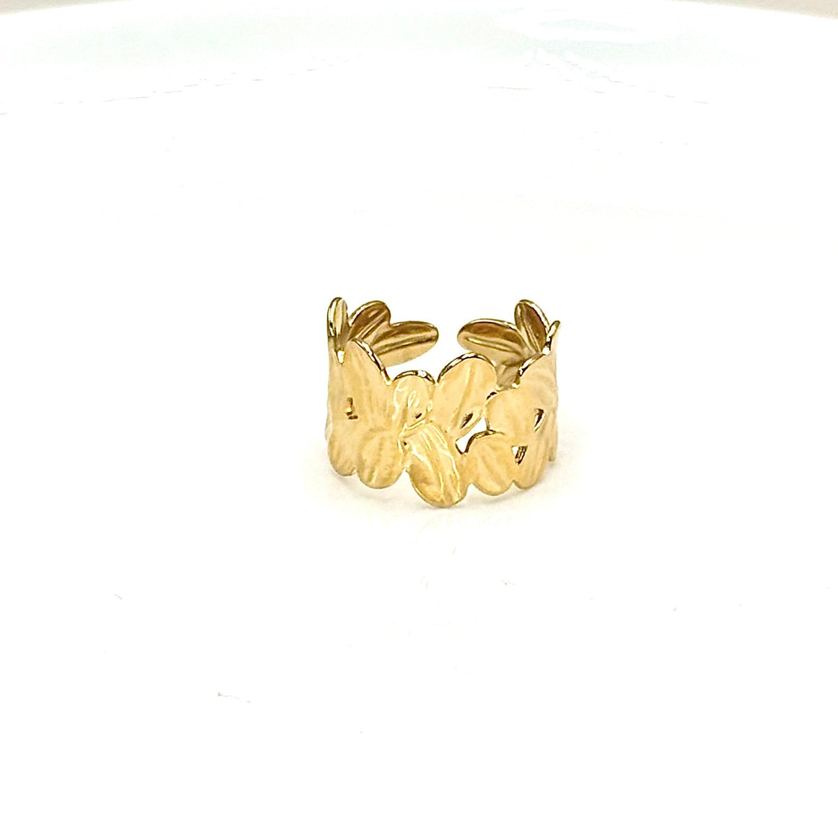 Bague dorée ouverte à motifs de fleurs et de feuilles