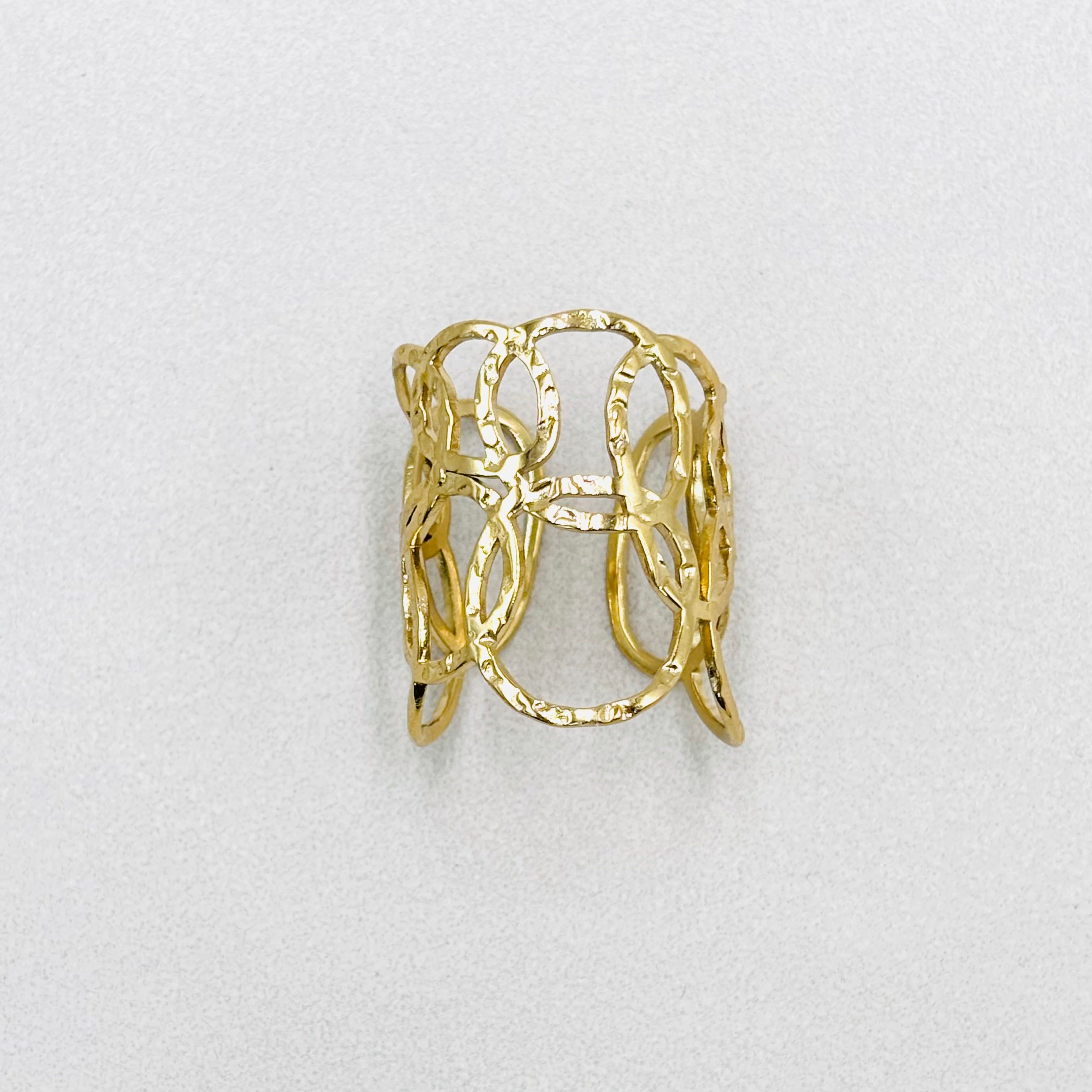 Bague large acier inoxydable dore ouverte avec cercles ajourés