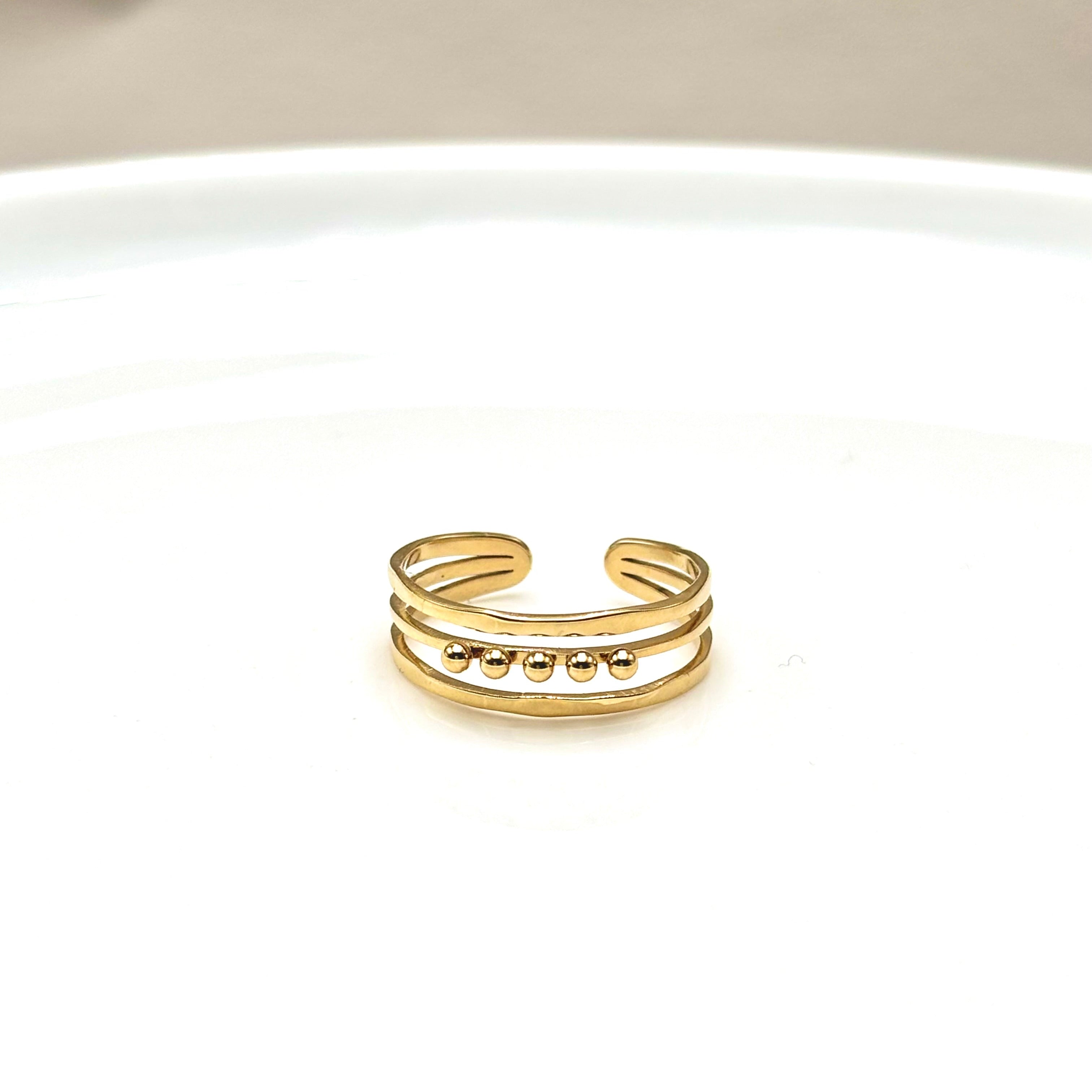 Bague en acier inoxydable doré ouverte 3 rangs dont un surmonté de 5 petites billes