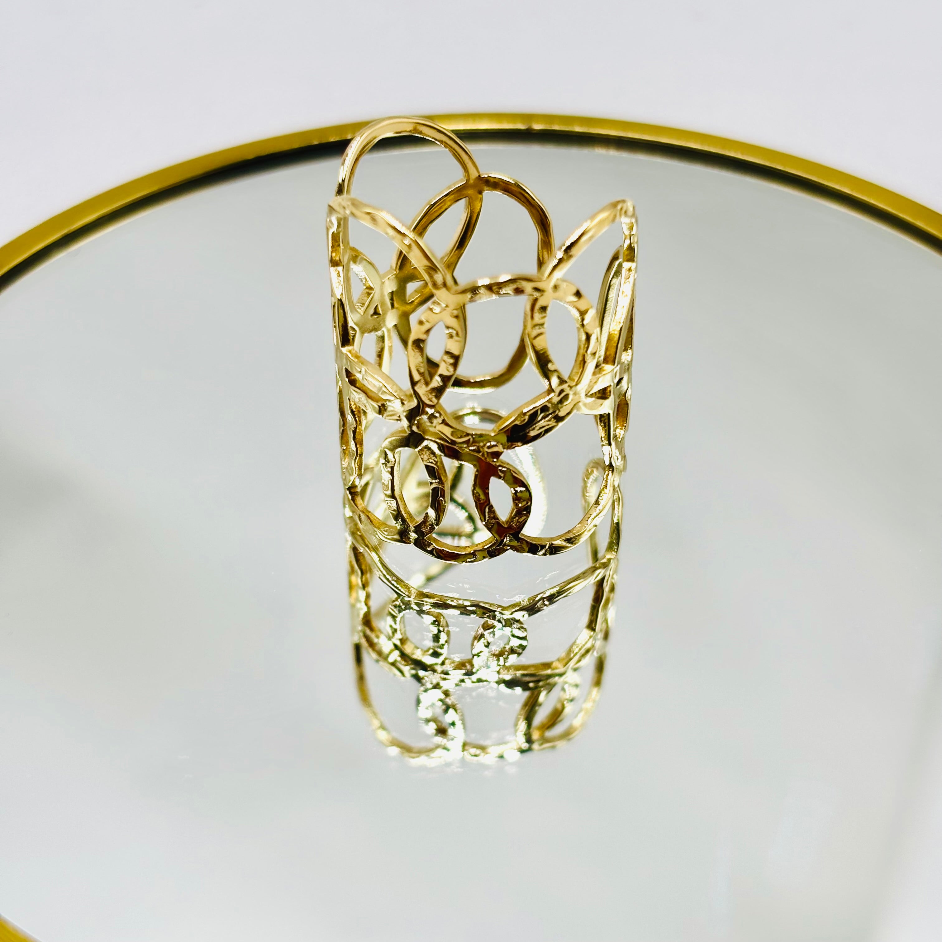 Bague en acier inoxydable doré large cercles ajourés