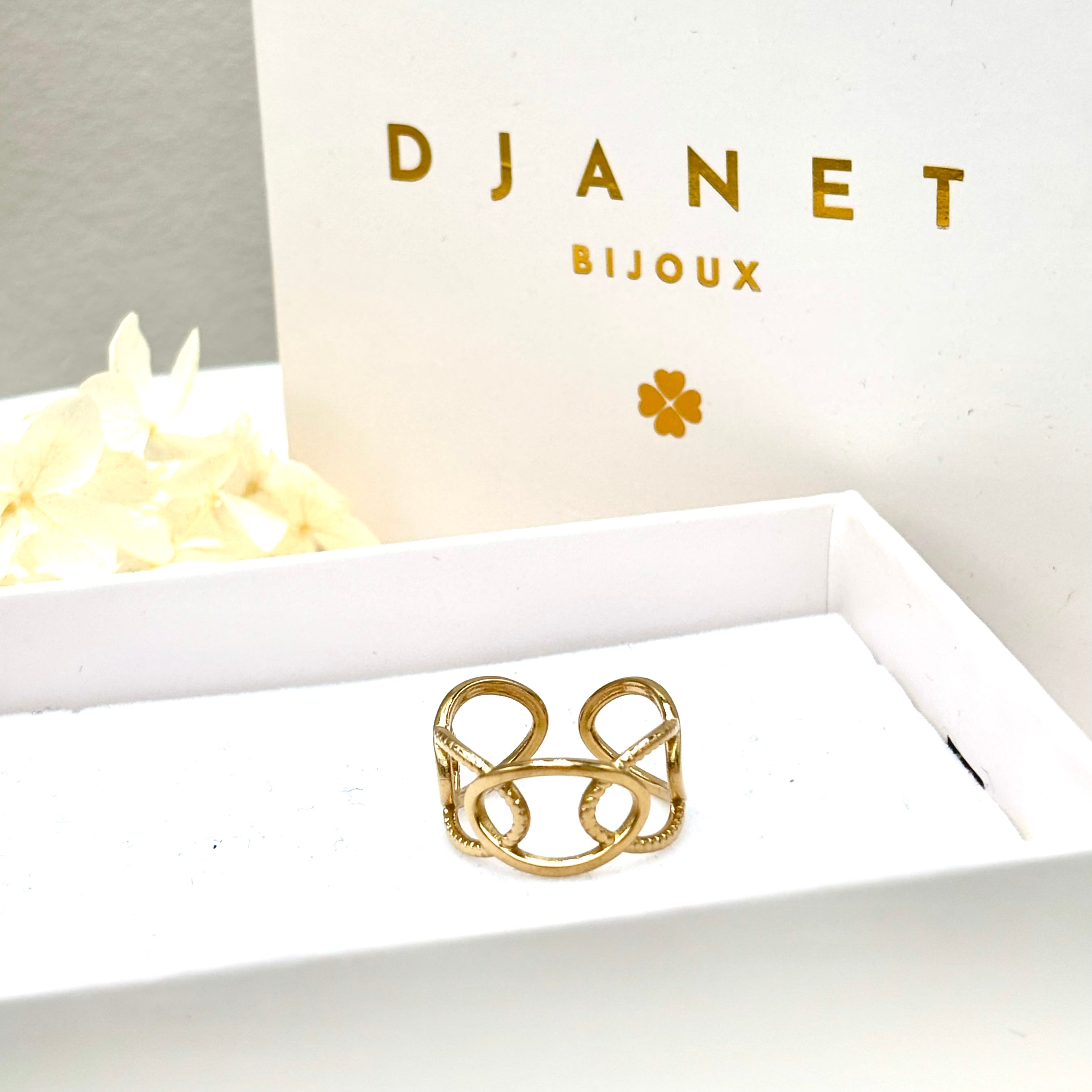 Bague en acier inoxydable doré femme avec ovales ajourés entrelacés Djanet Bijoux