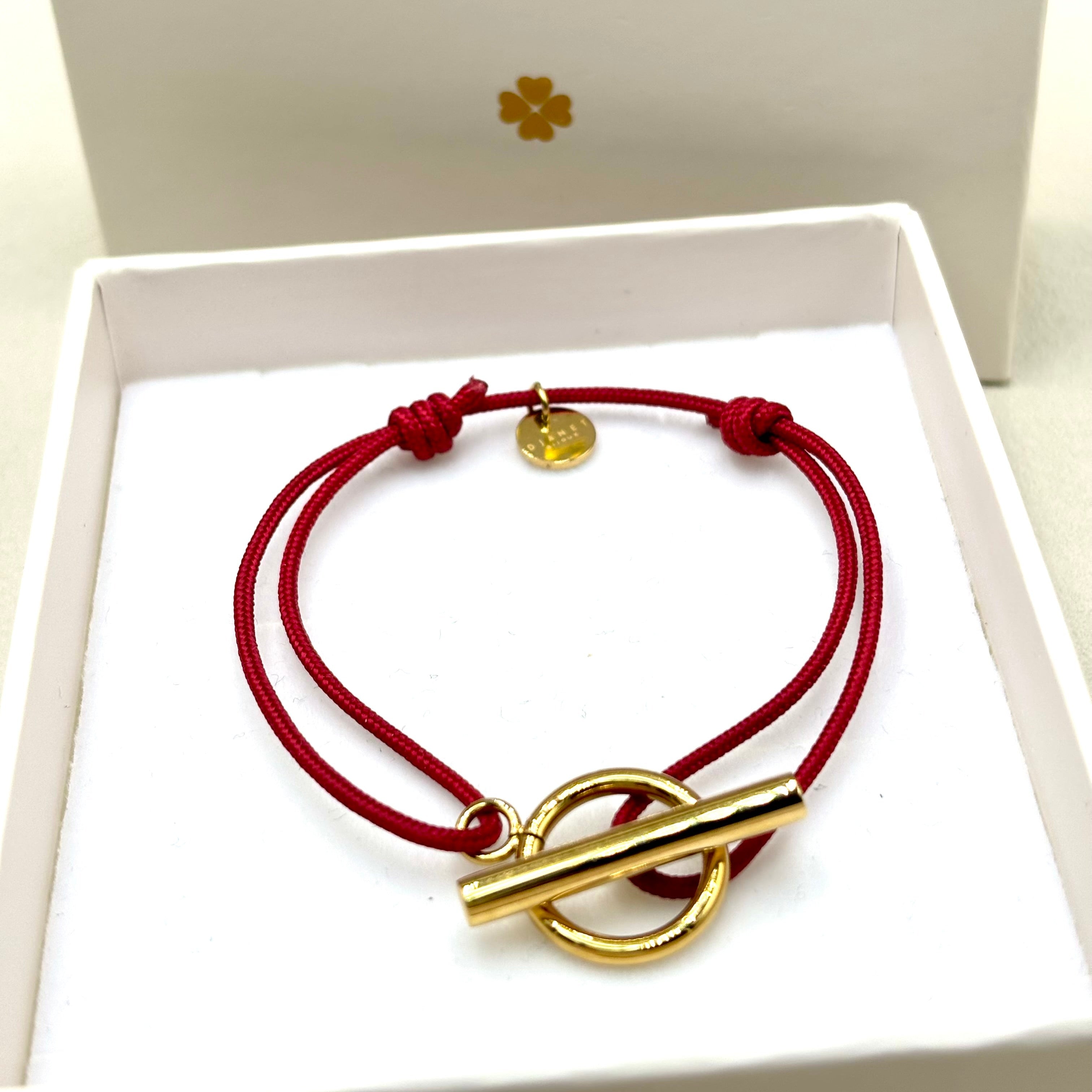Bracelet cordon rouge à noeuds coulissants fermoir T en acier inoxydable doré à l'or fin