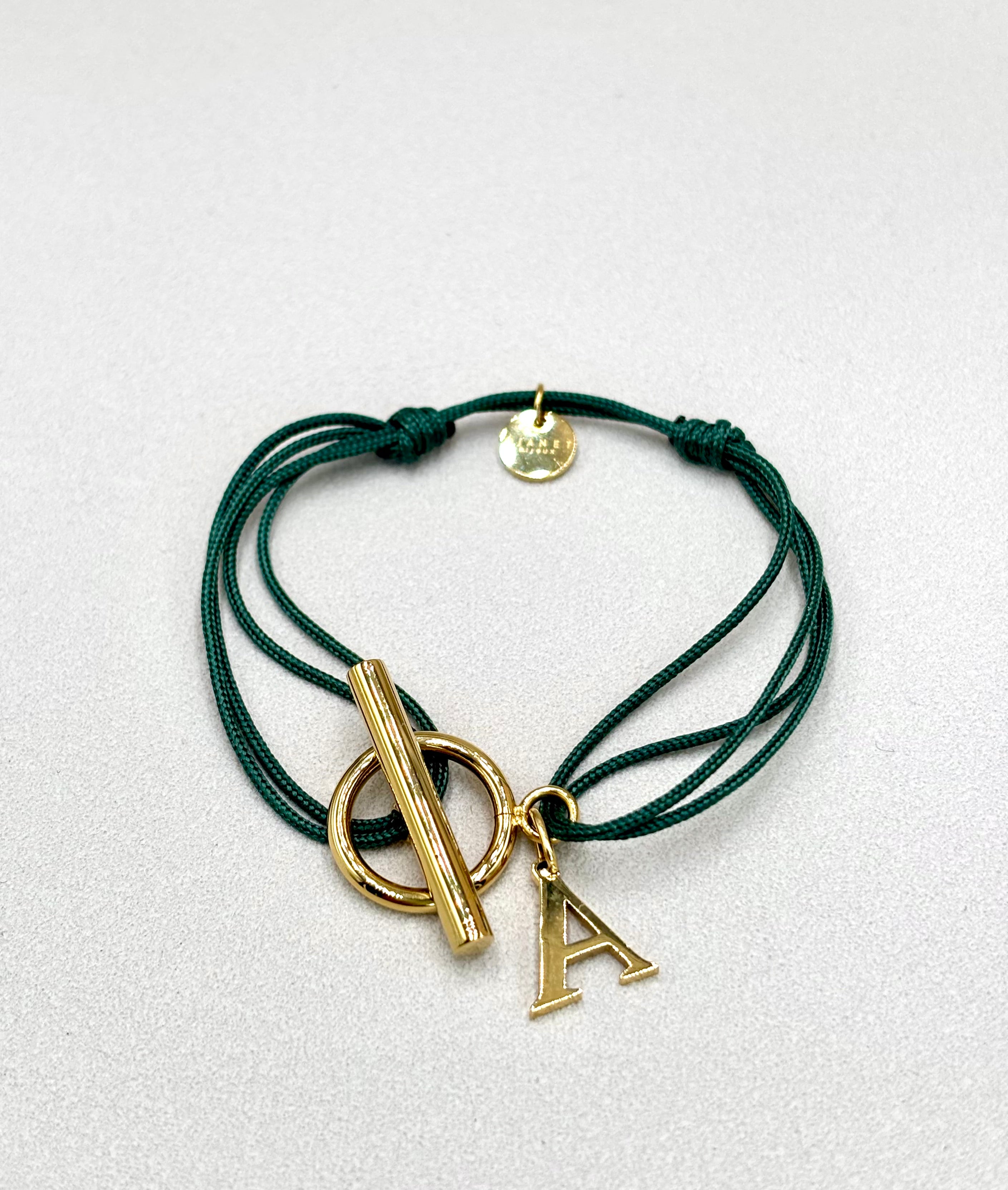 Bracelet cordon doublé vert personnalise avec lettre initiale fermoir T Toggle en acier inoxydable dore