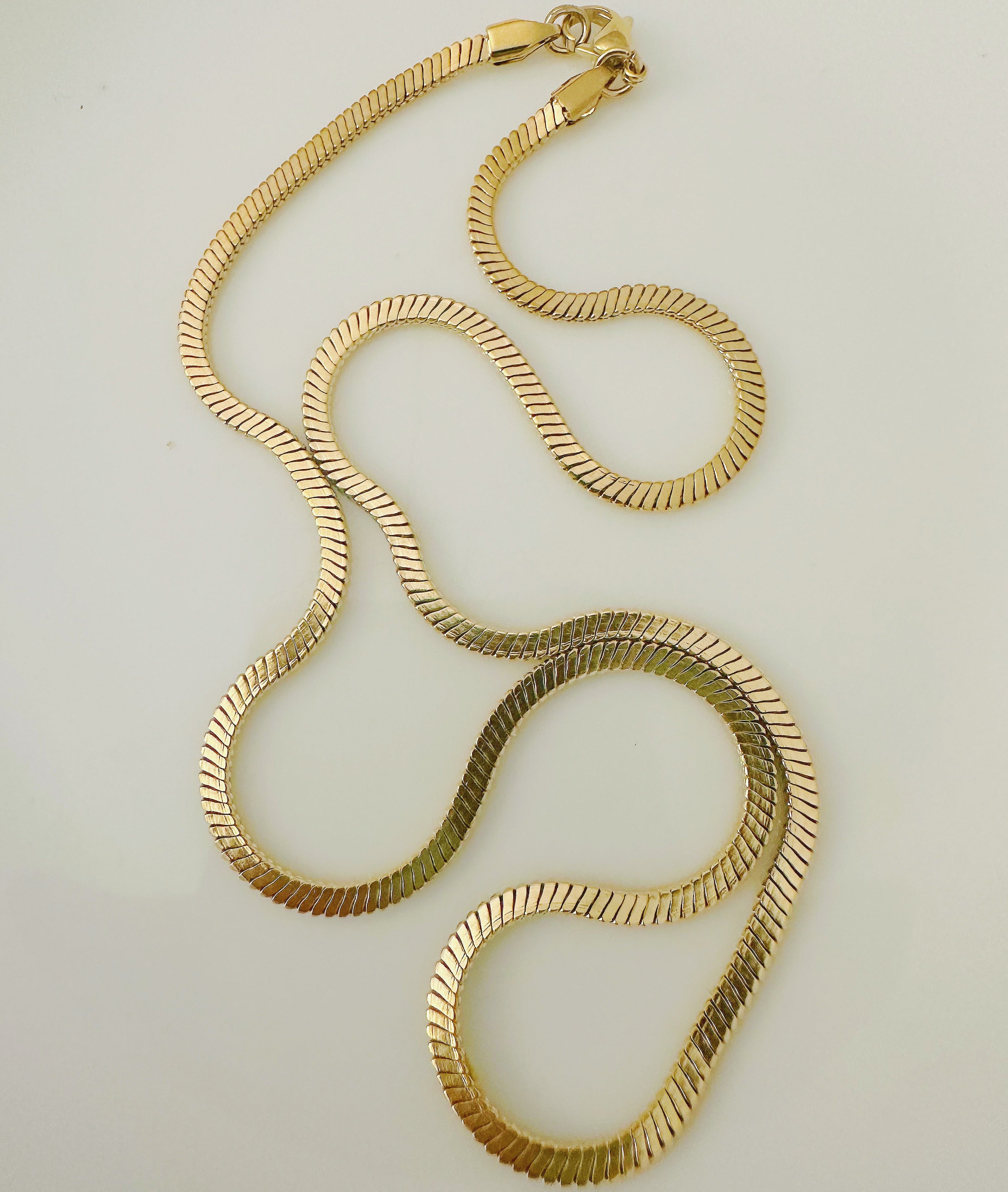 Collier chaine maille serpent acier inoxydable dore a l'or fin