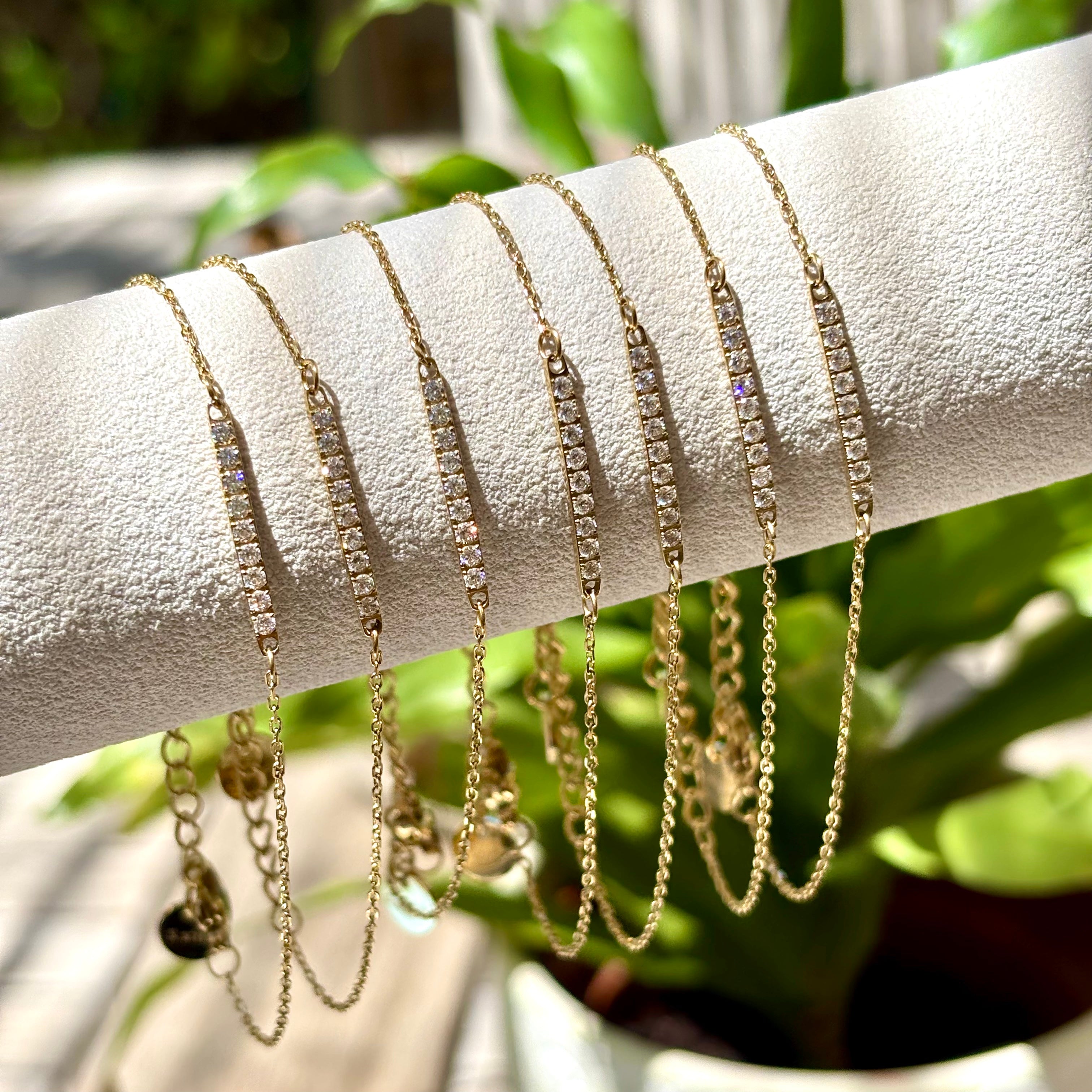 Bracelets barre sertie de zirconium en acier doré à l'or fin 14 carats