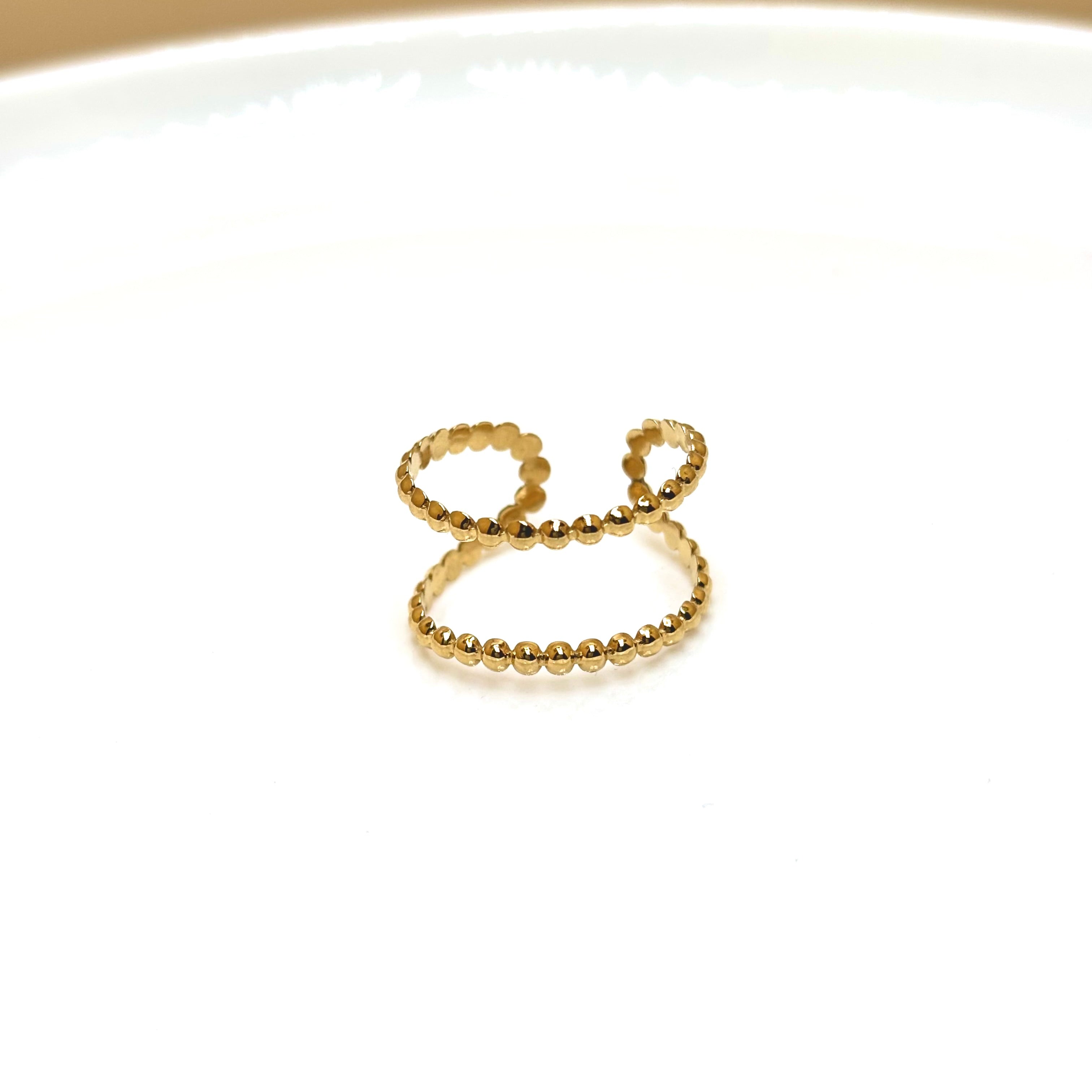 Bague acier doré double anneau perlé ouvert