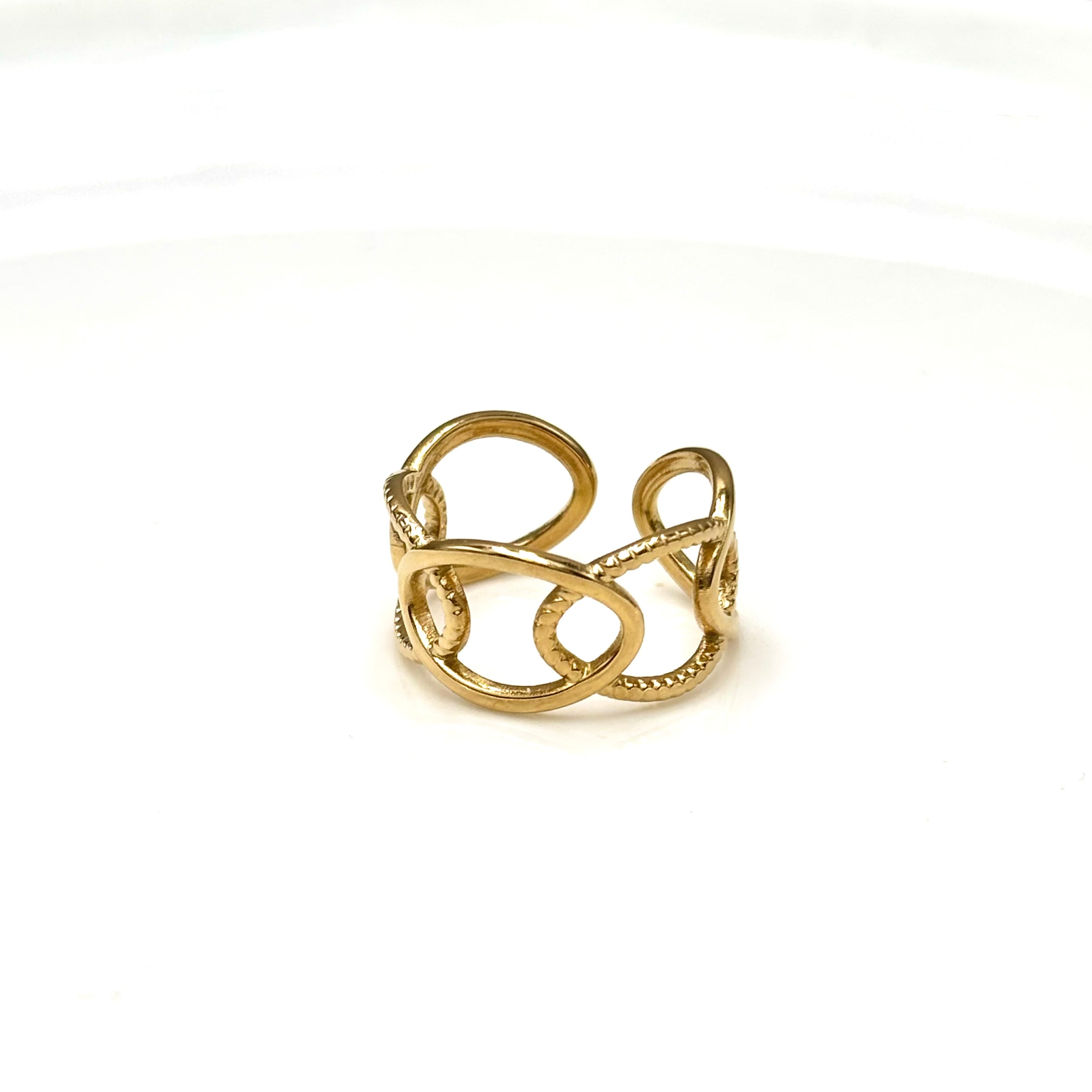 Bague en acier inoxydable doré femme avec ovales ajourés entrelacés 