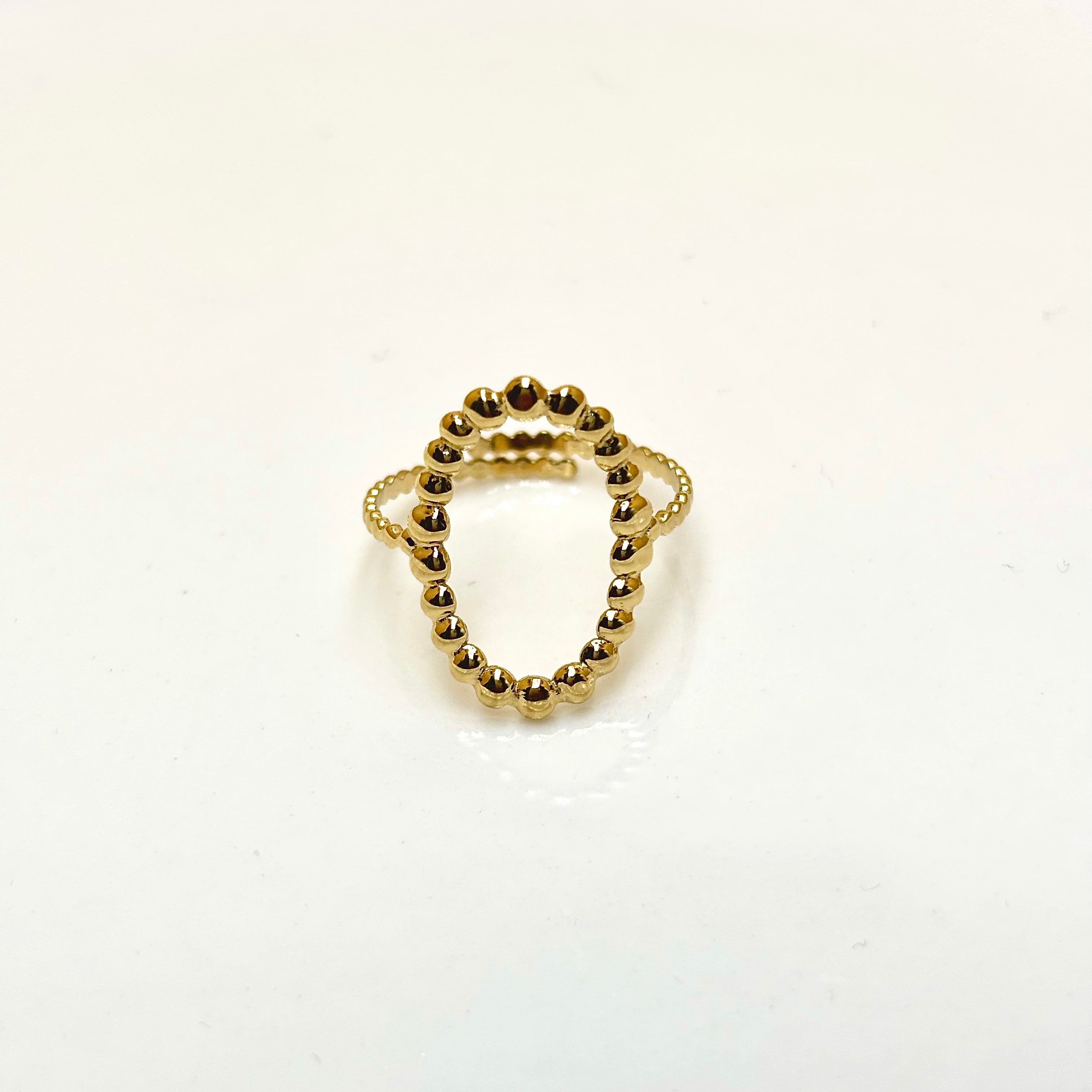 Bague ovale ajourée en acier inoxydable doré effet perlé anneau texturé ajustable