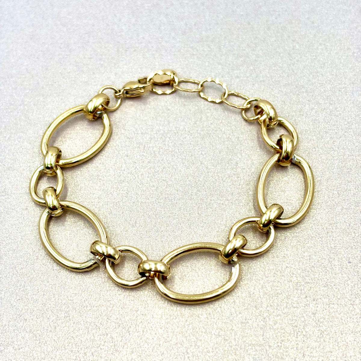 Bracelet femme en acier inoxydable doré  gros maillons et anneaux alterné