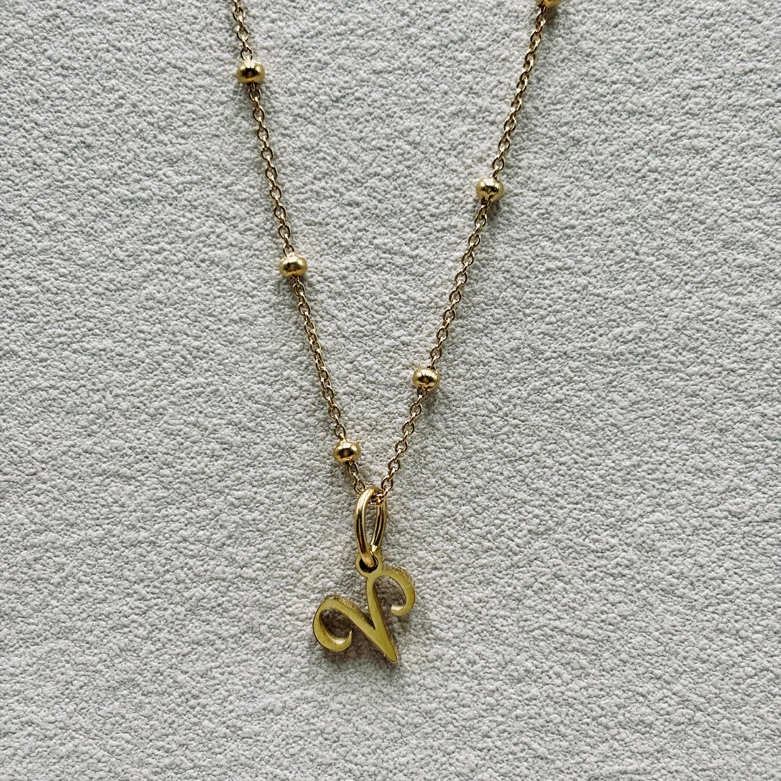 Collier pendentif astro bélier acier doré chaine maille boules 