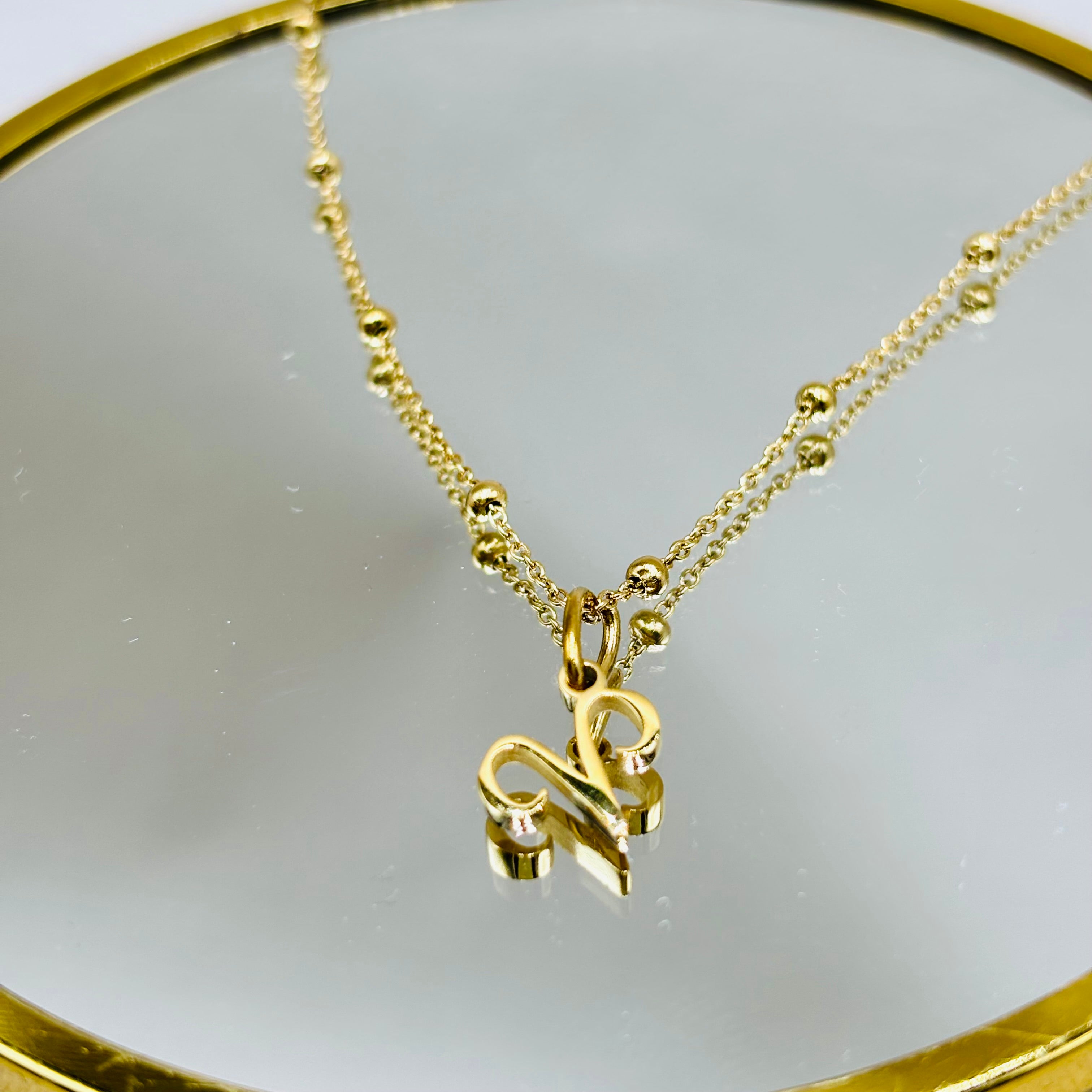Collier pendentif signe astro bélier chaine maille boules acier doré 