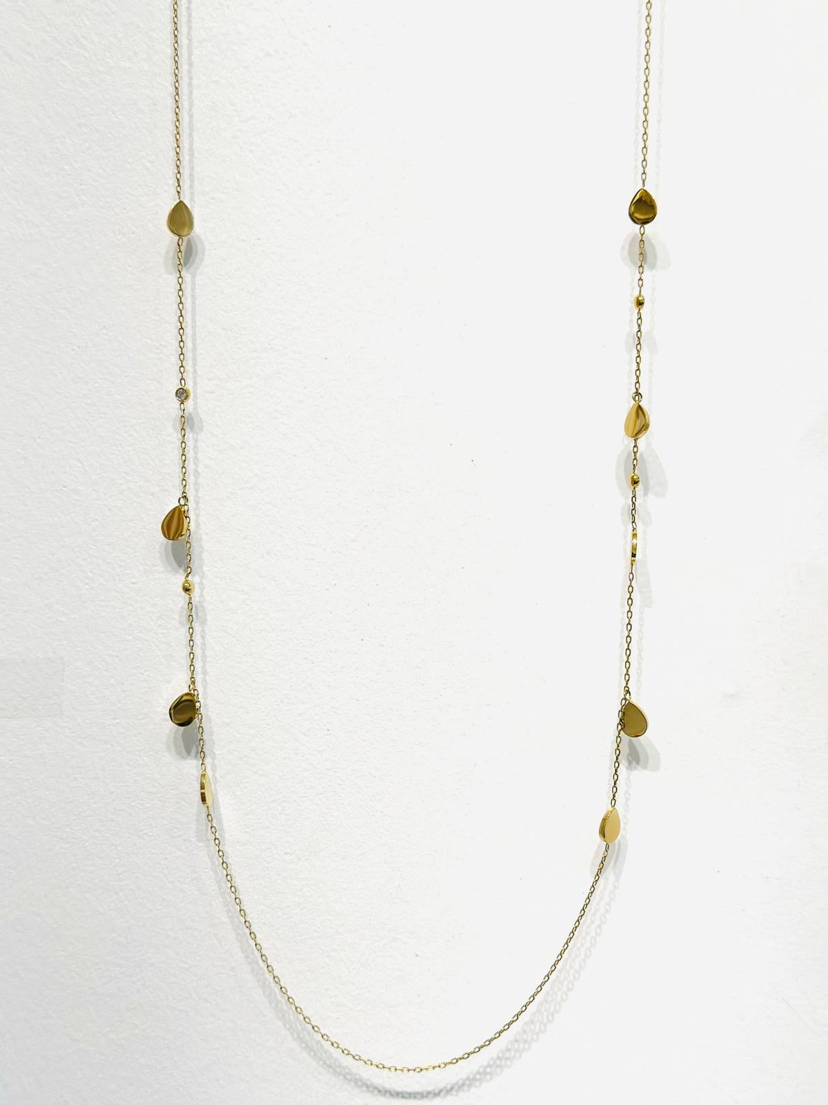 Collier long type sautoir 85 cm orné de gouttes en acier doré et zirconium